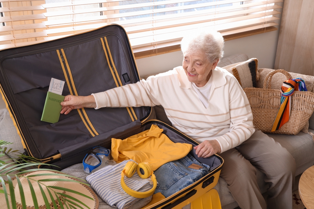 Retired woman packing luggage for cruise retirement