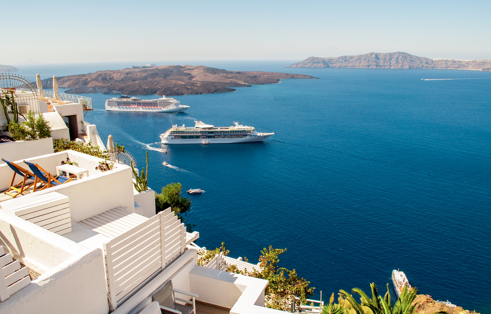 Residential cruise ship and white architecture at Santorini